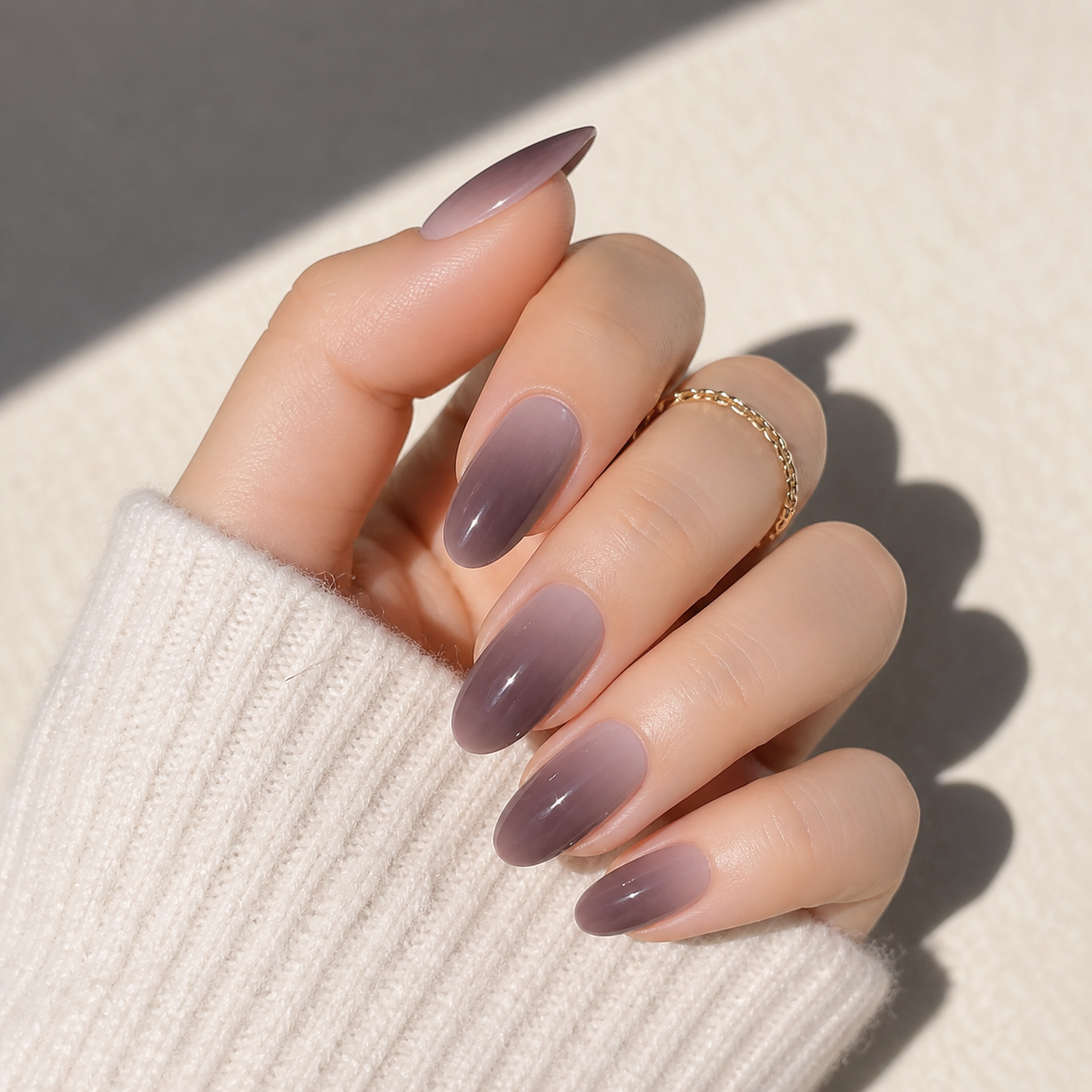 Set of 24 glossy press-on fake nails with assorted colors and full cover tips, perfect for natural-looking salon-style manicures.