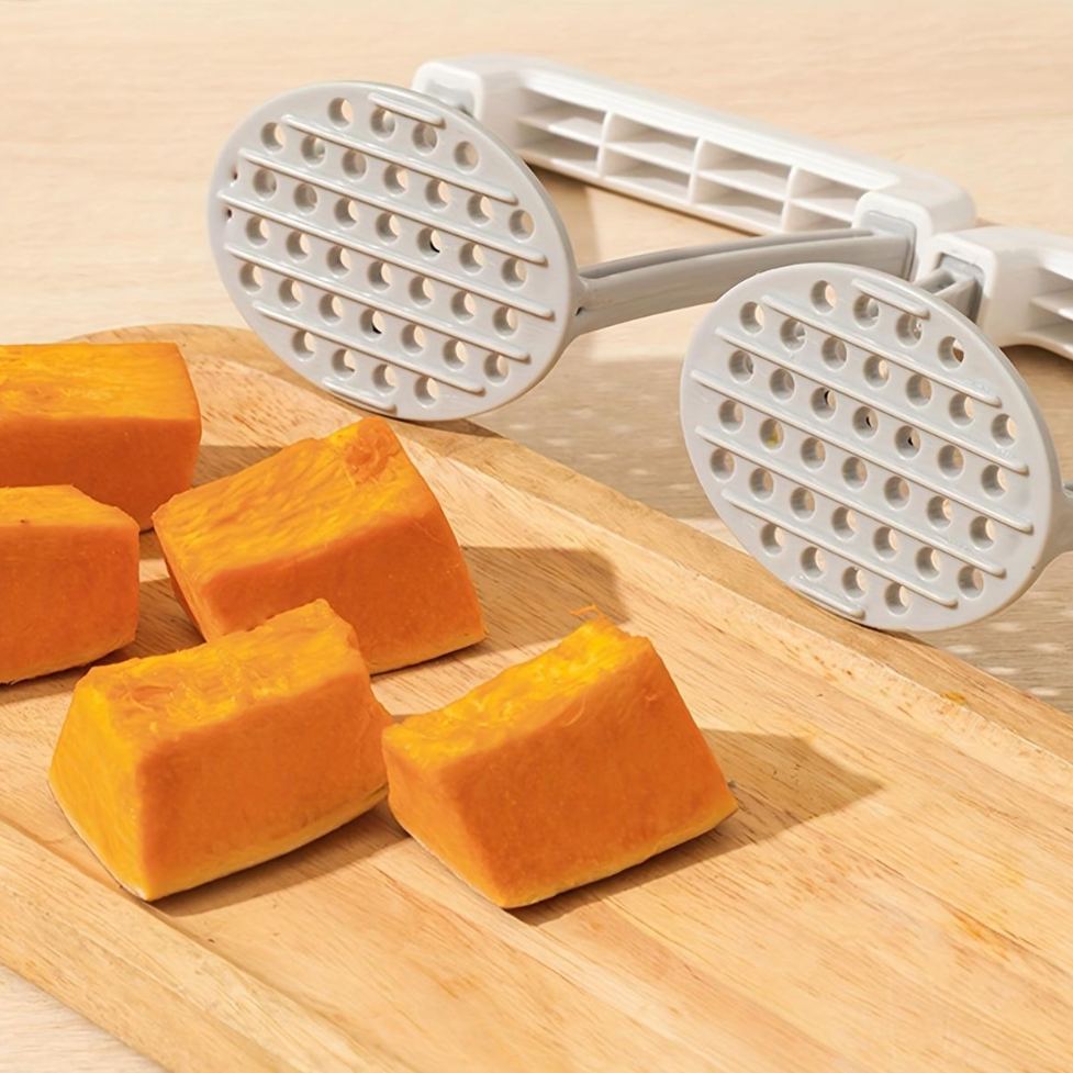 7AGAT manual potato masher with plastic handle, food masher tool for potatoes, vegetables, and fruits in a kitchen setting