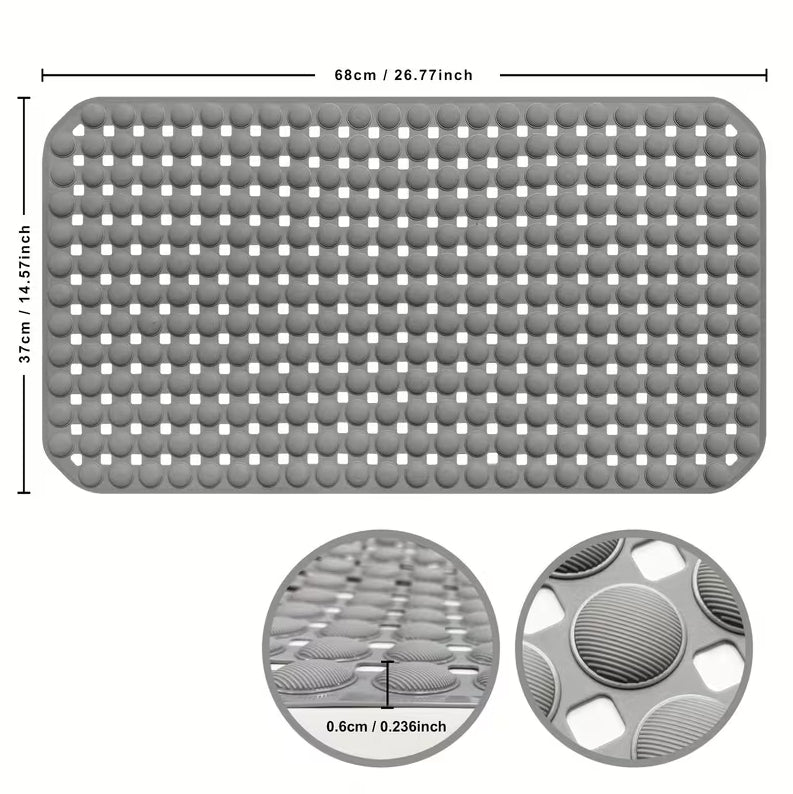 Perforated bath mat for water drainage