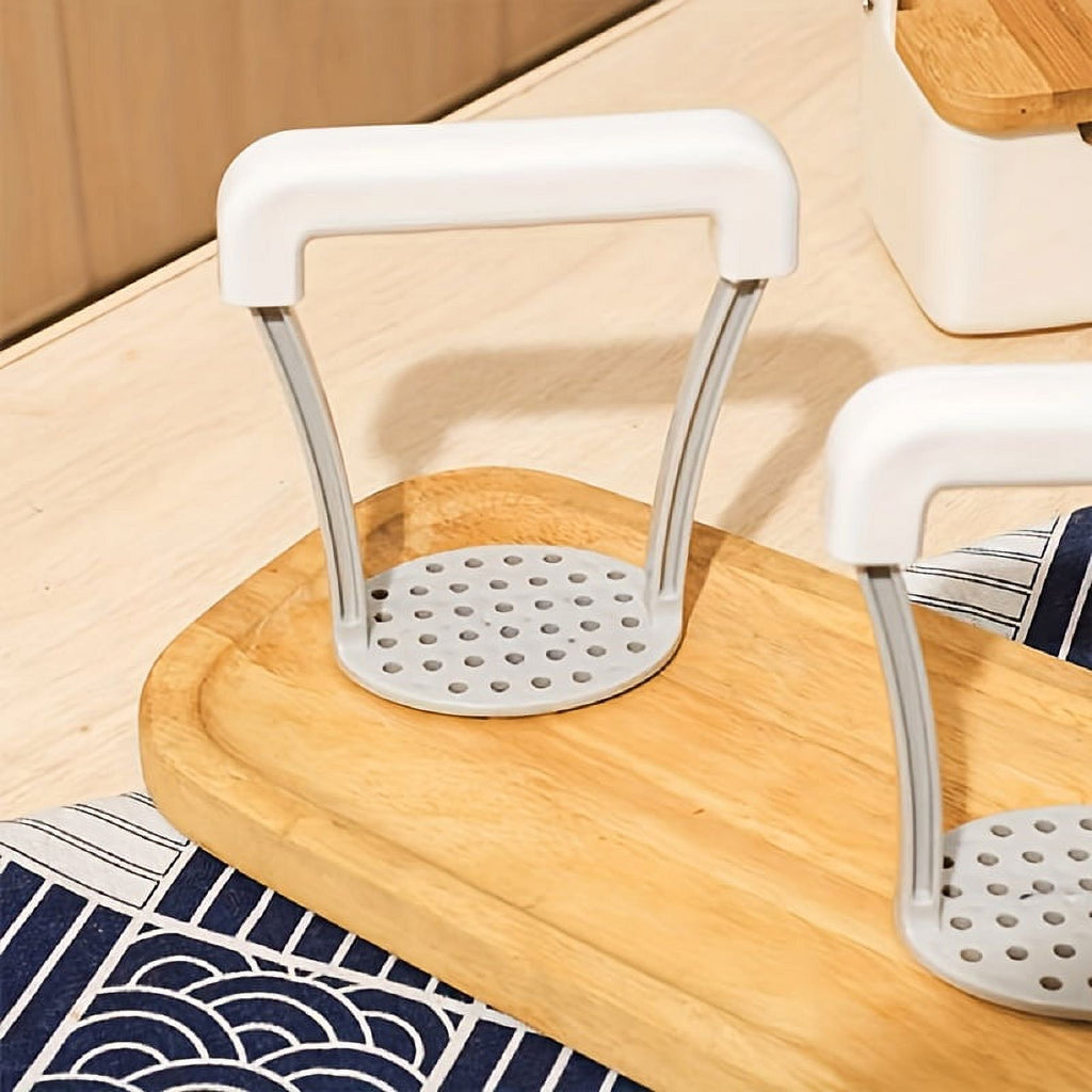7AGAT manual potato masher with plastic handle, suitable for mashing potatoes, vegetables, and fruits in cooking utensils.