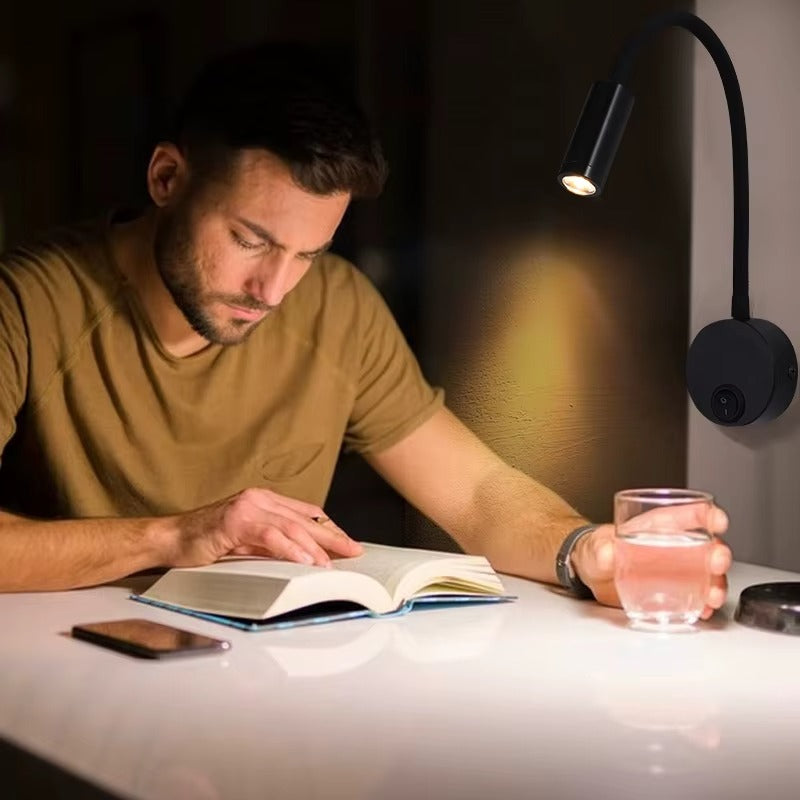 Modern LED wall reading light with gold finish, flexible gooseneck, integrated switch, ideal for bedrooms and study areas.