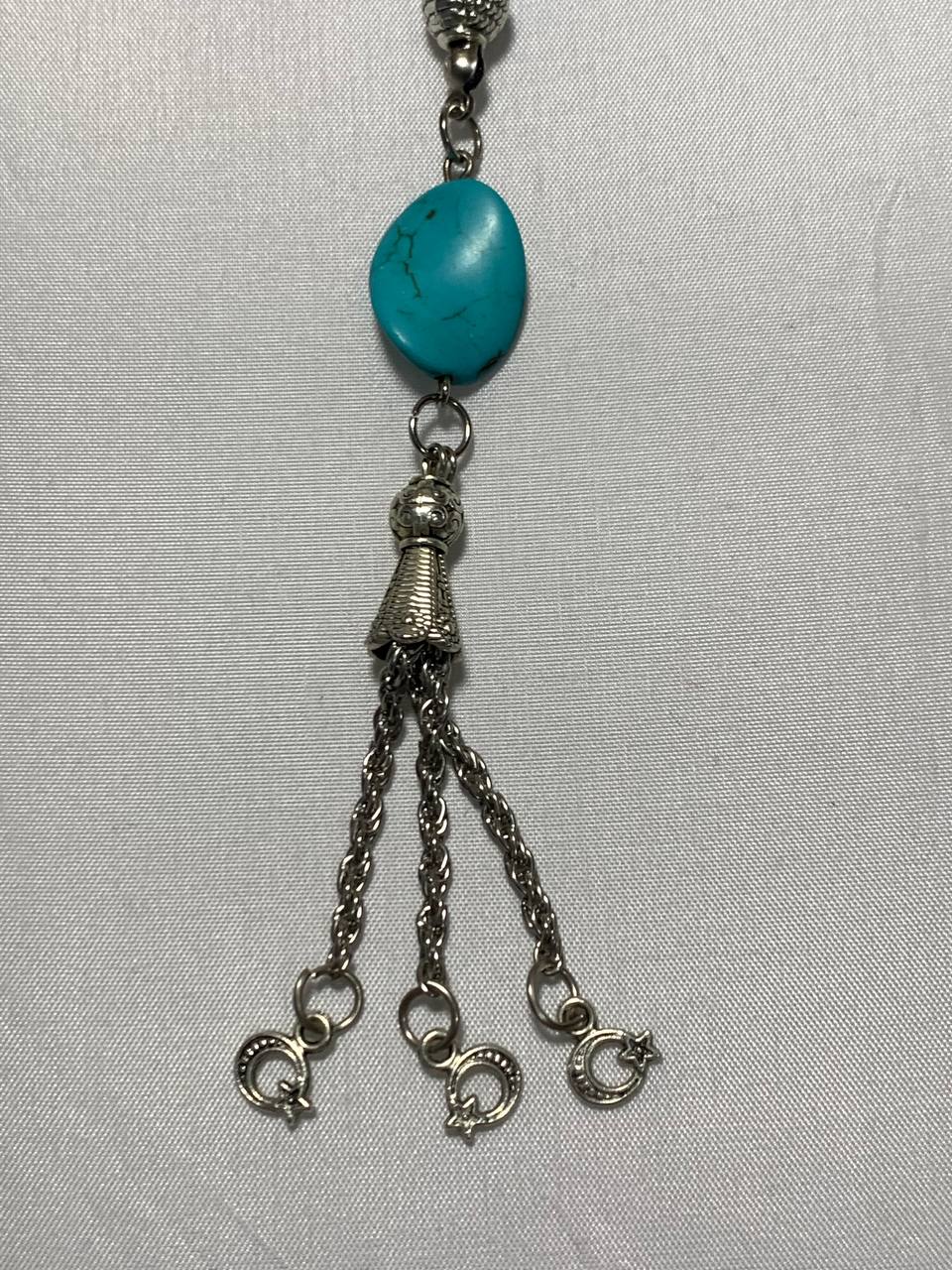 Handmade 7AGAT rosary with 33 large olive-shaped turquoise beads and sky blue prayer beads for meditation and spiritual reflection.