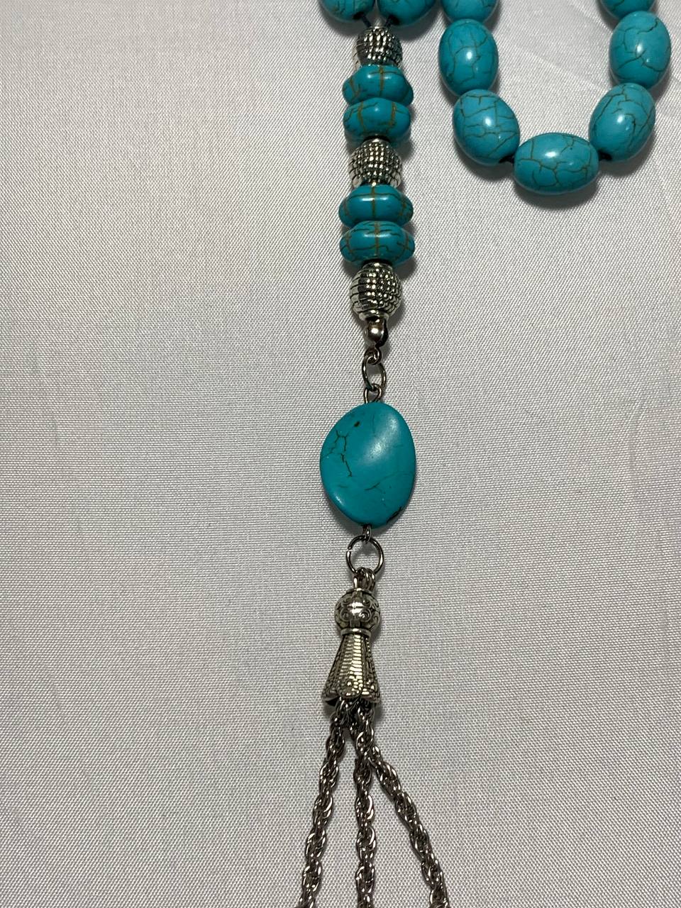 Handmade 7AGAT rosary with 33 large olive-shaped turquoise beads and sky blue prayer beads for spiritual meditation.