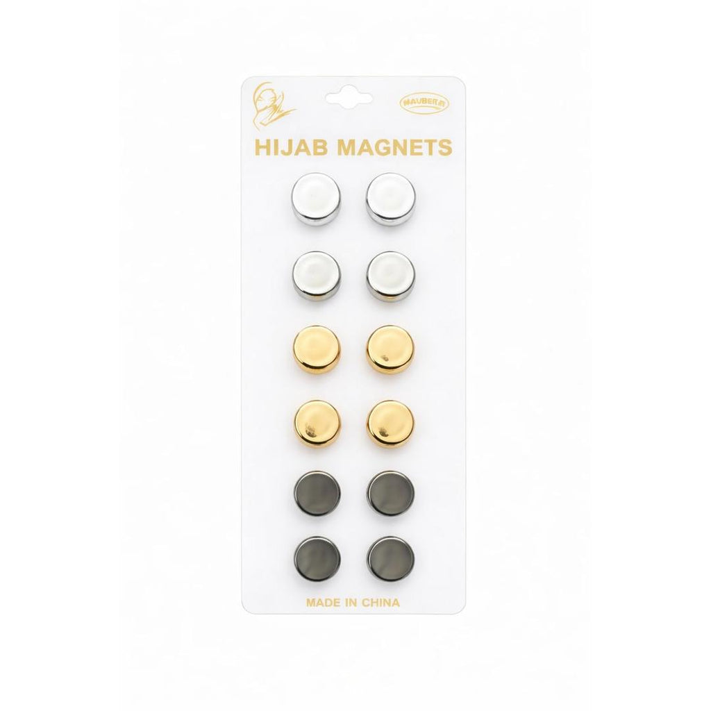 Packaging of hijab magnets with gold, silver, and black colors on a white background.